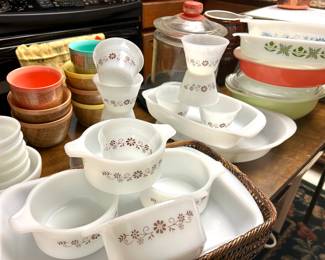 vintage Pyrex bakeware/kitchenware, cast iron skillets, old Tom’s covered canister