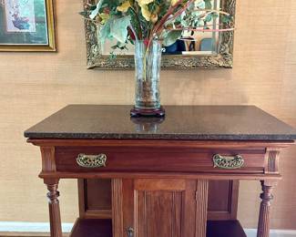 black marble top antique cabinet