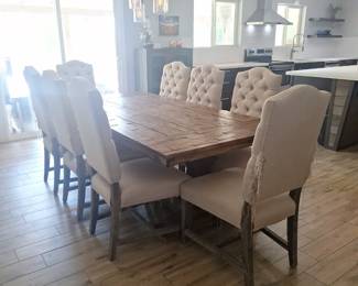 Dining room table with eight chairs and I purchased covers to go over them.