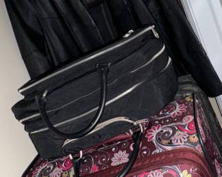 Lots of very pretty suitcases