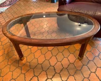 #30	Oval Glass top w/Brass Base Feet Coffee Table (as is finish) - 44x26x17	 $25.00 
