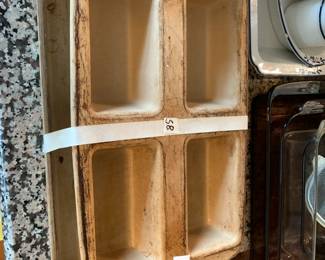 #58	Pampered Chef - 4 loaf pan and cookie sheet	 $22.00 
