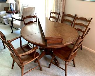 #6	Tell City  Wood Base w/Laminate top Table - w/2 leaves 46-66 Oval x29"T 2/6 chairs (1 captains Chair)	 $500.00 

