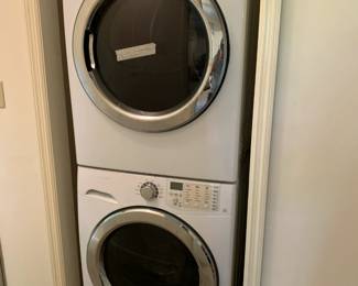 #34	Frigidaire Stacking Washer and Dryer  FASE7074NW (dryer) - Washer  - sold as a set (as is inside rim needs replacing)	 $300.00 
