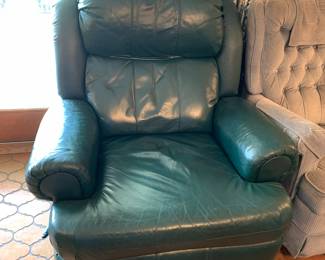 #24	Green leather Recliner w/continuous Seat	 $175.00 
