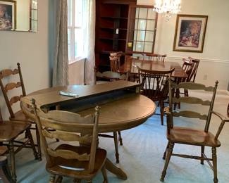 #6	Tell City  Wood Base w/Laminate top Table - w/2 leaves 46-66 Oval x29"T 2/6 chairs (1 captains Chair)	 $500.00 			
