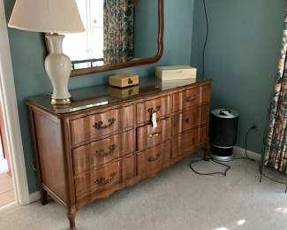 #41 Stanford Furniture Co. Solid Cherry Dresser w/9 drawers w/curved Front (as is missing two handles) w/glass protect - 60x19x31  Mirror - 47x33	 $125.00 			
