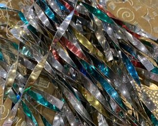 Loads of metal feather tree ornaments 