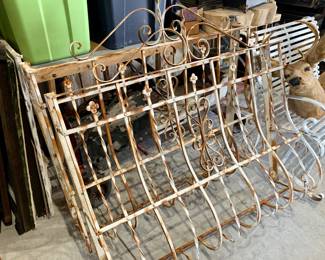 Early curved cast iron window grates