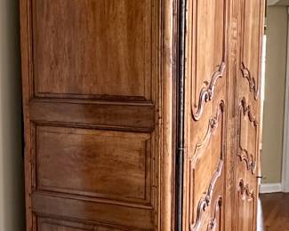 Imported from Normandy, France Circa 1800's..  This One of a Kind Antique Armoire was converted to be a piece of art or easily opened for a functional entertainment furniture piece. Our Homeowners invested over $25,000 in this pie
Height -104 inches 
Width - 58 inches 
Depth - 24 inches 
Will accomodate 61 inch Monitor Imported from Normandy, France Circa 1890's..  This One of a Kind Antique Armoire was converted to be a piece of art or easily opened for a functional entertainment furniture piece. Our Homeowners invested over $25,000 in this piece Height -104"  Width - 58" Depth - 24".  Will accomodate 60" HDTV/Monitor  or make an awesome Bar.  You need to see this.