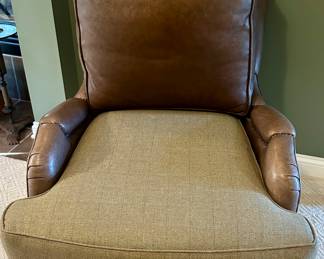 High Quality Pearson brand leather and fabric lounge accent chairs purchased from Merchandise Mart in Chicago. Two in a set with a tuffed fabric ottomon that matches the pane wool fabric on the seat of the chairs. As shown in photos these chairs were originally all leather. They were upholstered with a custom pane wool fabric on the seats and the original leather can be interchanged. Chairs have very substantial wooden legs. The tuffed ottomon has 3 buttons that have uplifted - buttons are there. 
Seat Height - 22 inches 
Seat Depth - 24 inches 
Dimensions - 34 inches wide by 43 inches High&nbsp; &nbsp; 