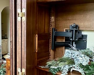 Imported from Normandy, France Circa 1800's..  This One of a Kind Antique Armoire was converted to be a piece of art or easily opened for a functional entertainment furniture piece. Our Homeowners invested over $25,000 in this pie
Height -104 inches 
Width - 58 inches 
Depth - 24 inches 
Will accomodate 61 inch Monitor Imported from Normandy, France Circa 1890's..  This One of a Kind Antique Armoire was converted to be a piece of art or easily opened for a functional entertainment furniture piece. Our Homeowners invested over $25,000 in this piece Height -104"  Width - 58" Depth - 24".  Will accomodate 60" HDTV/Monitor  or make an awesome Bar.  You need to see this.