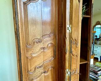 Imported from Normandy, France Circa 1800's..  This One of a Kind Antique Armoire was converted to be a piece of art or easily opened for a functional entertainment furniture piece. Our Homeowners invested over $25,000 in this pie
Height -104 inches 
Width - 58 inches 
Depth - 24 inches 
Will accomodate 61 inch Monitor Imported from Normandy, France Circa 1890's..  