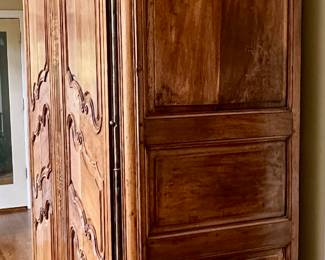 Imported from Normandy, France Circa 1800's..  This One of a Kind Antique Armoire was converted to be a piece of art or easily opened for a functional entertainment furniture piece. Our Homeowners invested over $25,000 in this pie
Height -104 inches 
Width - 58 inches 
Depth - 24 inches 
Will accomodate 61 inch Monitor Imported from Normandy, France Circa 1890's..  This One of a Kind Antique Armoire was converted to be a piece of art or easily opened for a functional entertainment furniture piece. Our Homeowners invested over $25,000 in this piece Height -104"  Width - 58" Depth - 24".  Will accomodate 60" HDTV/Monitor  or make an awesome Bar.  You need to see this.