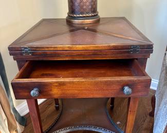 Theodore Alexander 2 Tier single drawer flip-top game Table. Very unique and special piece. 
Height - 29”
Width - All 4 sides the same at 21”
Open - 42” end to end