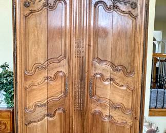 Imported from Normandy, France Circa 1890's..  This One of a Kind Antique Armoire was converted to be a piece of art or easily opened for a functional entertainment furniture piece. Our Homeowners invested over $25,000 in this piece Height -104"  Width - 58" Depth - 24".  Will accomodate 60" HDTV/Monitor  or make an awesome Bar.  You need to see this.