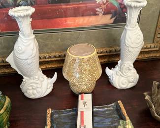 The fish candleholders are Maitland Smith.