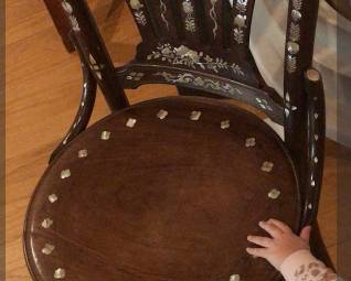 Mother of pearl in-laid bent wood chair.