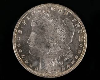 1882-P MORGAN SILVER DOLLAR | In an envelope listing it as "borderline MS 65".
