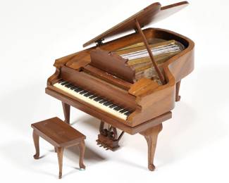RALPH PARTELOW MINIATURE GRAND PIANO | Miniature dollhouse piano in the French Provincial style, signed and dated 9-78 on underside, with matching piano bench
 - l. 6.25 in.