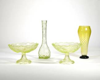 (4pc) VASELINE GLASS COMPOTES & VASES | Including a pair of Vaseline glass compost with grape and leaf motif plus a pinched bottle vase and a blown glass vase with swirling pattern - h. 5.5 x dia. 8 in. (Compote)