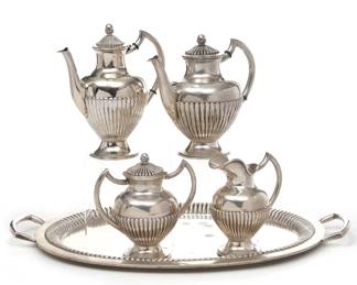 (5pc) GERMAN SILVER TEA & COFFEE SET | German 800 silver coffee and tea service comprising a coffee pot, tea pot, open pitcher, and double-handled lidded sugar, with a matching serving tray with a stork or eagle hallmark, stamped 833 (24.75 in.); all together 144.29 ozt. - w. 8.25 x h. 9.5 in. (coffee pot, over handle)