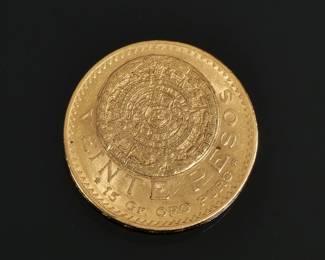 1919 VEINTE PESOS "AZTEC SUNSTONE" MEXICAN GOLD COIN | Decorated with an eagle holding a snake and other Aztec devices, 16.6g - dia. 1.175 in.