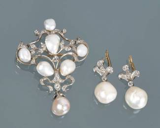 (3pc) ANTIQUE NATURAL PEARL & DIAMOND DEMI PARURE | Comprising a shield-form brooch with open scrollwork mounting six baroque pearls and melee diamonds set in 18k gold (marked 18k) and suspending one bead cultured pearl (2 in., 14.4 g) ; plus a pair of matching fleur-de-lis earrings suspending large pearls (12.5 mm and 12.1mm, together 7.6 g). Accompanied by GIA Report No. 6237088489 describing three of the pearls on the brooch as Semi-baroque, White, Variously Colored Overtones, Natural Freshwater, Unionidae species; the drop pearl tested as cultured.