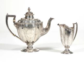 (2pc) ENGLISH STERLING TEAPOT & PITCHER | Sterling silver teapot with acorn finial with London hallmarks and date marks c. 1878, with a matching open pitcher of small size c. 1879; together 32.7 ozt
 - l. 9.75 x w. 5.5 x h. 9.25 in. (teapot)
