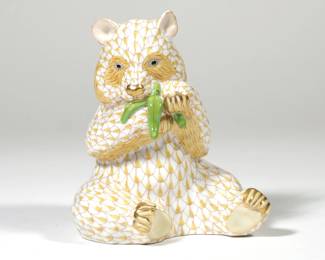 HEREND PORCELAIN PANDA BEAR | Panda bear in yellow fishnet with gilt highlights, marked and numbered on the bottom - l. 4 x w. 4 x h. 5 in.

