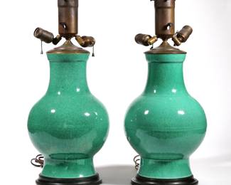 (2pc) PAIR APPLE GREEN LAMPS | Green glazed porcelain lamps with "cracked ice" glaze mounted on black wood stands - h. 14 x dia. 9 in. (vase only)