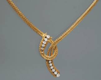 DIAMOND & 18K GOLD ITALIAN NECKLACE | Designed as a double snake chain with a conforming "knot" mounting ten graduated round brilliant cut diamonds (.05 to .15 ct); approx 1 cttw diamonds; 17 in. (approx.), 45.1g
