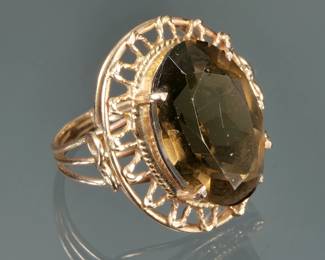 SMOKEY QUARTZ & GOLD ROPEWORK RING | An oval faceted smokey quartz set in yellow gold; size 6, 6.4g
