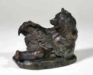 (AFTER) ANTOINE-LOUIS BARYE (FRENCH, 1796-1875) | Reclining bear. Bronze. Signed "BARYE" Unmounted - l. 5 x w. 3.25 x h. 4 in.
