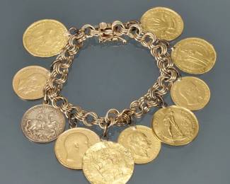 ANTIQUE GOLD COIN CHARM BRACELET | Designed as 10 early European gold coins with soldered bails suspended from a 14k gold triple-hoop link bracelet; total weight 53.7g.
