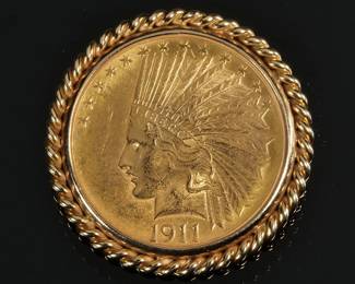 U.S. $10 GOLD COIN PIN | In a 14k gold twisted wirework surround with pin mounting.