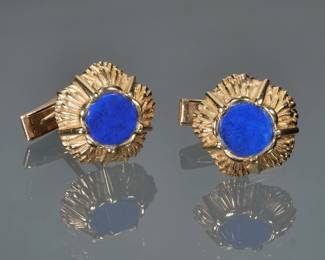PAIR LAPIS LAZULI & 14K GOLD CUFFLINKS | Each having a central round polished lapis lazuli in a molded patterned gold surround; 3/4 in., 12.1g total weight; marked "14k".

