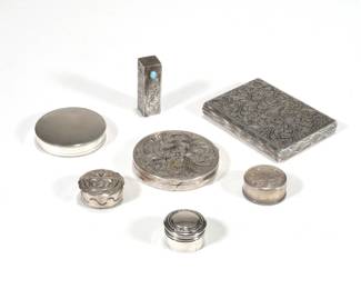 (7pc) 800 & STERLING SILVER BOXES | Including an 800 silver cigarette case, a matching compact, and matching lipstick compact with turquoise cabochon, each with engraved acanthus pattern; plus a round 800 silver compact with mirror and gilt interior, a round Native American style box, a Gorham sterling lid on a hard plastic box, and a small silver lidded pill box [unable to open / examine markings]; total weight 8.98 ozt (incl. mirrored surfaces, excl. plastic box)
 - l. 3.75 x w. 3 in. (cigarette case)