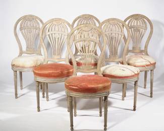 (6pc) MONTGOLFIERE FRENCH HOT AIR BALLOON CHAIRS | Round seats, hot air balloon openwork splats, with spindle turned rear support, frame decorated with rosettes, raised on turned reeded legs - l. 24 x w. 18 x h. 40 in.
