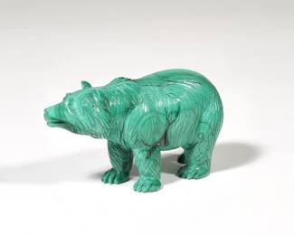 CARVED MALACHITE BEAR | A carved malachite bear with fur details, depicted standing on all fours, with no apparent label or signature - l. 3.25 x w. 1.75 x h. 1.75 in.