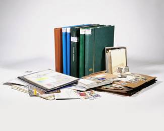 WORLD STAMP COLLECTION | A large collection of stamps in five albums, plus an assortment of unmounted / unbound sheets and loose stamps; including two albums of Falkland Islands stamps from 1935 and later [the album with more contemporary stamps only about half full]; a mostly-filled album of Ross Dependency stamps; and three albums of misc. stamps from around the world, one including Belize, Bermuda, Australia opal stamps, Ceskoslovensko, Magyar, Paraguay, and more; one including Monaco, Maldives, China, Dominica, Congo, and more, with three U.S. $2 dollar bills in the back; and a binder sparsely filled with stamps from Republica de Guinea Ecuatorial, Russia, Korea, Poland, Barbados, and others; plus a number of loose stamps from Spain, U.S., and more.
