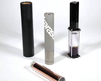 (4pc) CONTEMPORARY KALEIDOSCOPES | Including a 1985 Chromascope signed "D. Kalish", a black leather-wrapped cylindrical kaleidoscope signed "C Huber", a 1978 Judith Karelitz "Karascope" in original tube, and an indistinctly signed black lucite liquid kaleidoscope dated 1994 (l. 12.75 in.)