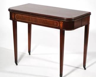 ANTIQUE FLIP-TOP TABLE | Regency breakfast or games table, extending base with fold-out support legs, decorated with reeding and urn and line inlays; 40 x 40 in. extended - l. 40 x w. 20.5 x h. 31 in. (Folded)