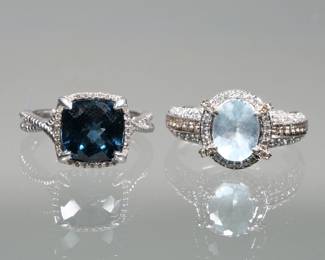 (2pc) FACETED BLUE STONE & 14K GOLD RINGS | Including a ring with central oval modified cut aquamarine or blue quartz surrounded by lines of melee diamonds (size 7, 4.4g); and a mixed square faceted blue stone ring in a bezel of melee diamonds (size 5.5, 3.9g) both tested to 14k, no apparent markings.

