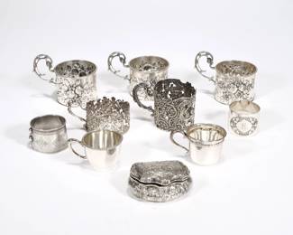 (13pc) SMALL CONTINENTAL SILVER ITEMS | 800 silver, each with fineness mark, including a set of 3 cup liners, 2 individual cup liners, 2 napkin rings, 2 demitasse cups, and a small repousse lidded box; all together 20.68 ozt  - l. 3.5 in. (box)
