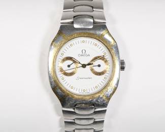 OMEGA POLARIS SEAMASTER WRISTWATCH | C. 1980's, white dial with gold sub dials, dot numerals, steel case and band with 18k gold highlights; case diameter 32mm - l. 7 in. (band approx.)
