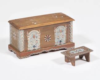 (2pc) NATASHA DOLLHOUSE MINIATURES | Including a miniature painted blanket chest and a matching foot stool (l. 1.5 in.), each signed and dated 1980 - l. 3.25 x w. 1.5 x h. 1.75 in. (chest)

