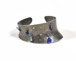 ART STERLING SILVER CUFF BRACELET | Suspending gemstones.
