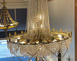 Italian 1960 Chandelier adorned with hundreds of crystals measuring 34"w x 42"h