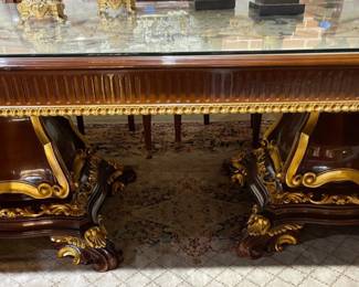 Base of Louis XV Style Solid Wood Dining Table with two solid wood gold adorned legs.